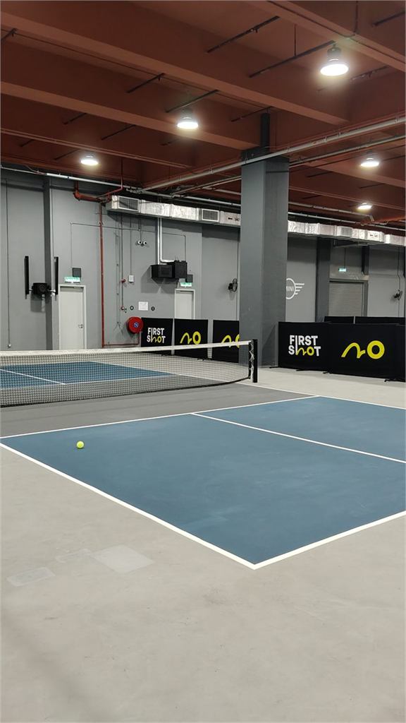First Shot pickleball court signage and indoor court